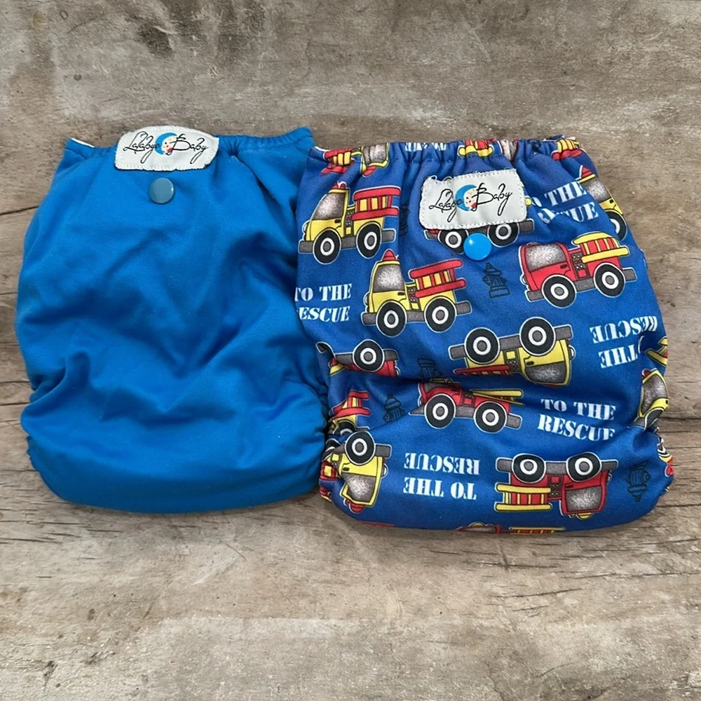 Lalabye Baby, one size cloth diapers reusable. Pair, one print one solid. *USED*